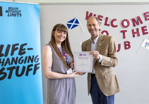 The Duke presents a Social Value Certificate to Caitlin Nightingale in recognition of participants' volunteering The Duke presents a Social Value Certificate to Caitlin Nightingale in recognition of participants' volunteering